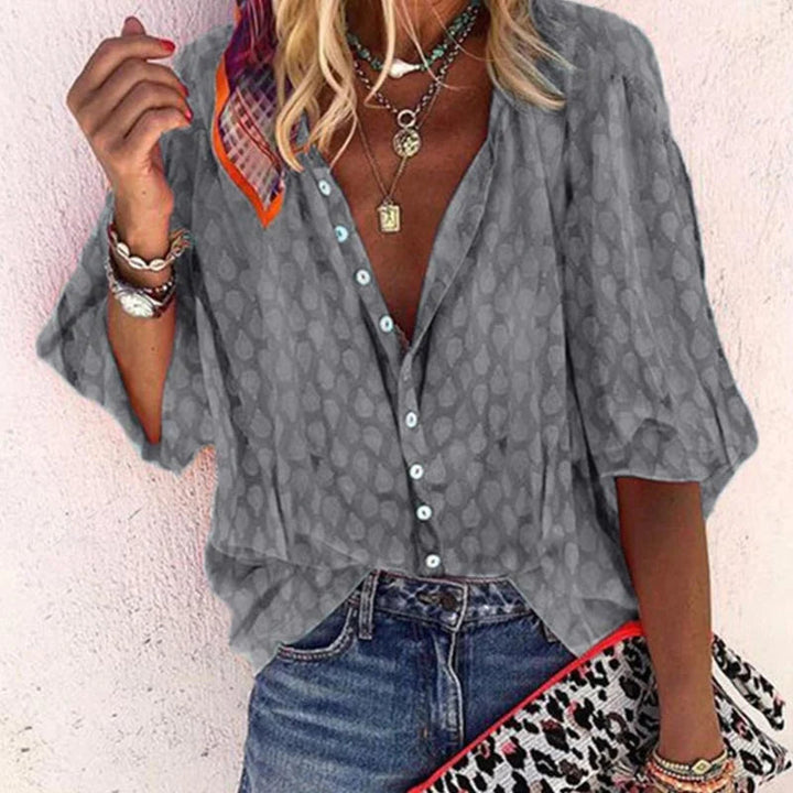 Blouse met korte mouwen en ronde hals