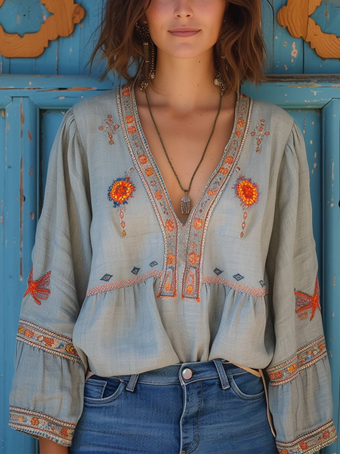 Dames Peplum Blouse met Borduursel - V hals