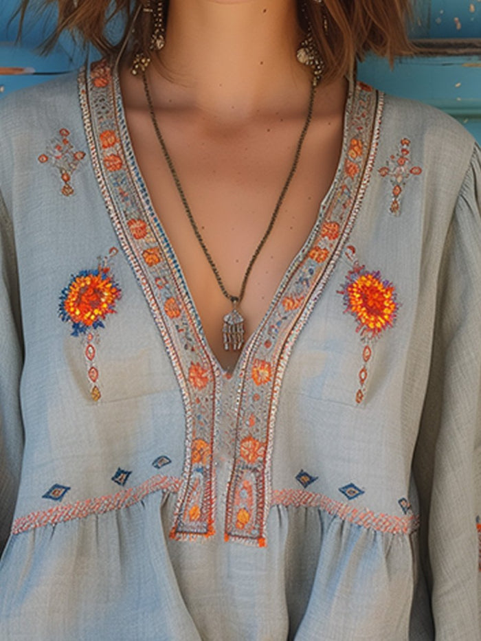 Dames Peplum Blouse met Borduursel - V hals