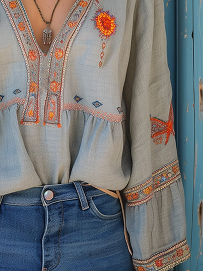 Dames Peplum Blouse met Borduursel - V hals
