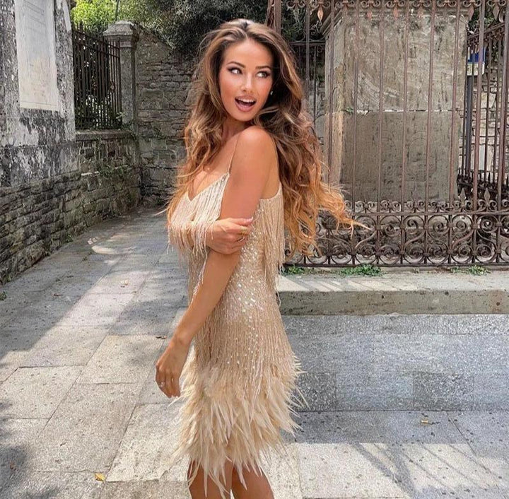 Feestjurk met pailletten en verenzoom - Elegante Mini Dress
