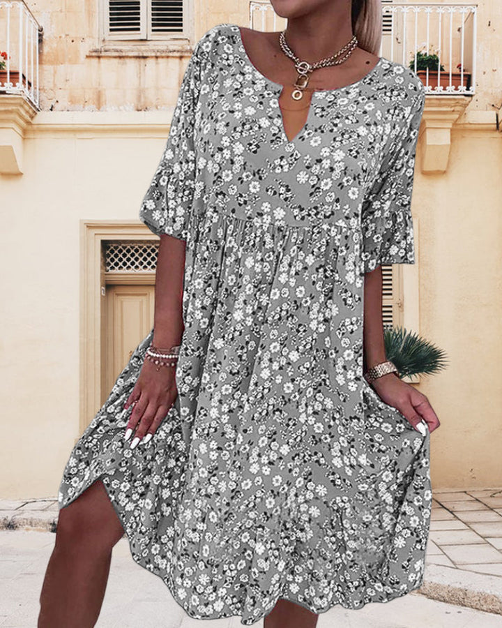 Zomerse Jurk met Bloemenprint en Korte Mouwen - Midi